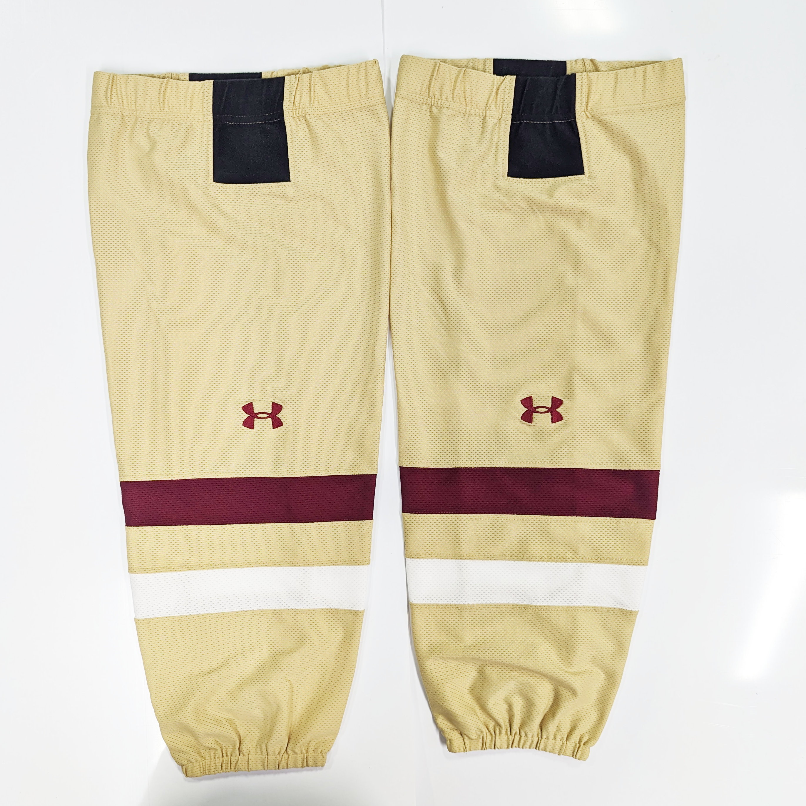 NCAA - Chaussettes de hockey Under Armour d'occasion (or/blanc/marron)